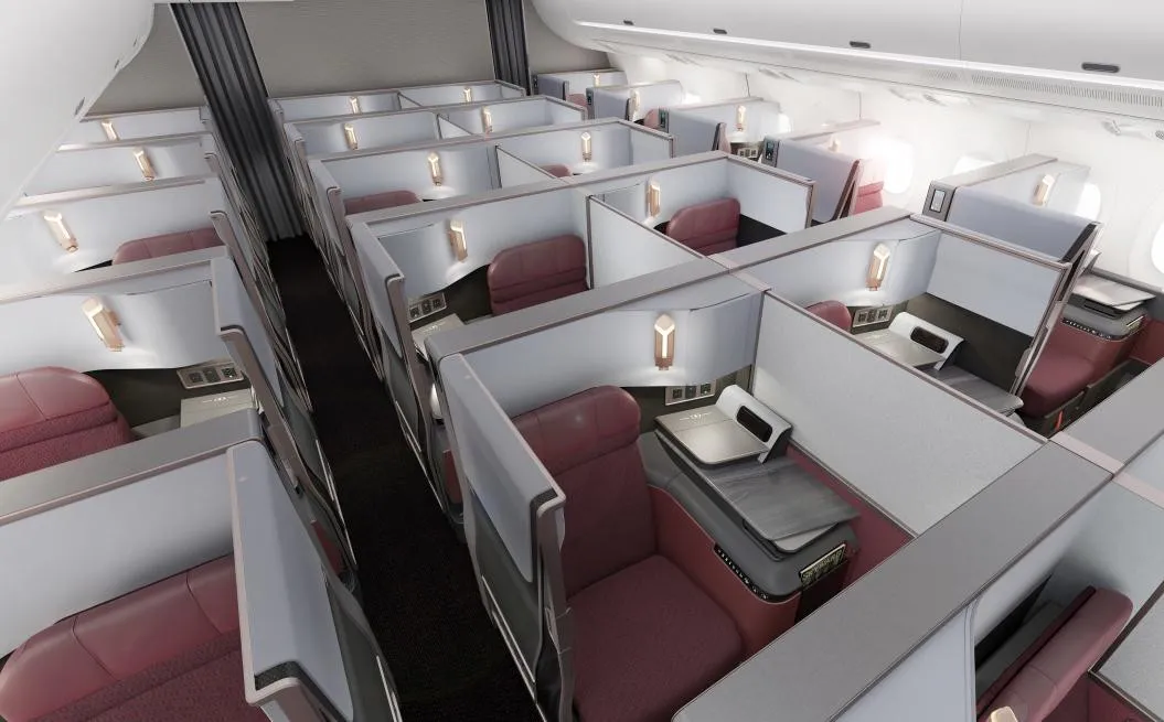 Japan Airlines business class cabin with individual passenger suites