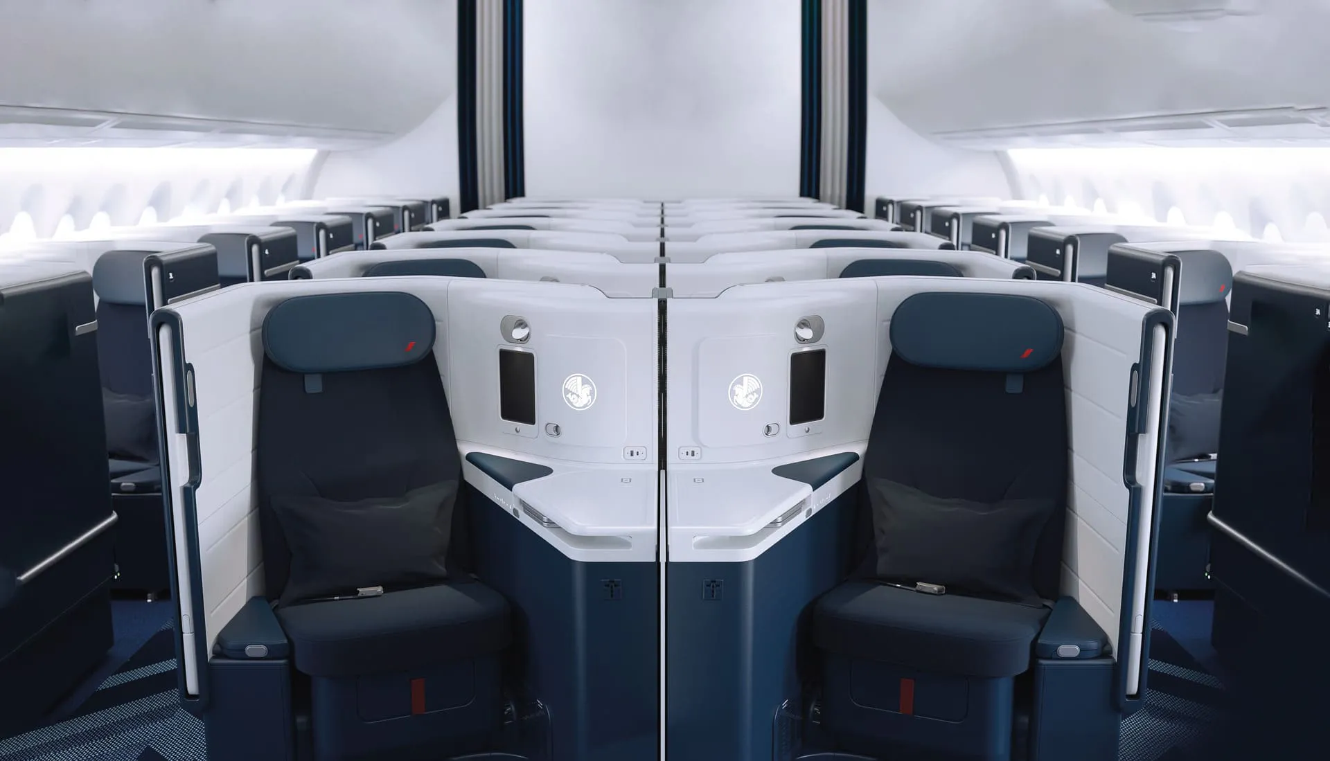 Air France business class seats inside a modern Airbus aircraft cabin